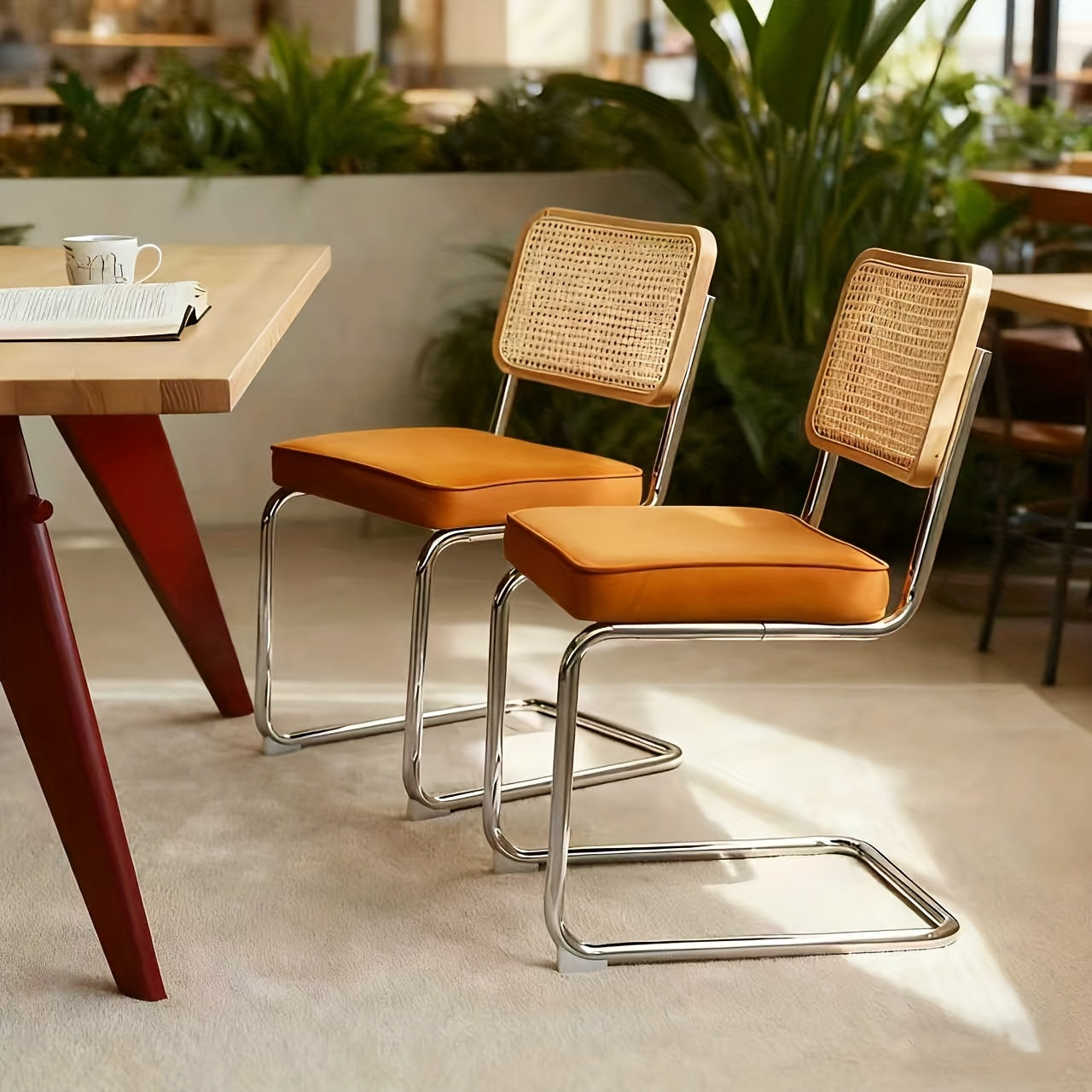 Set of Two Dining Chairs Featuring Velvet And Rattan, Designed with Chrome Legs